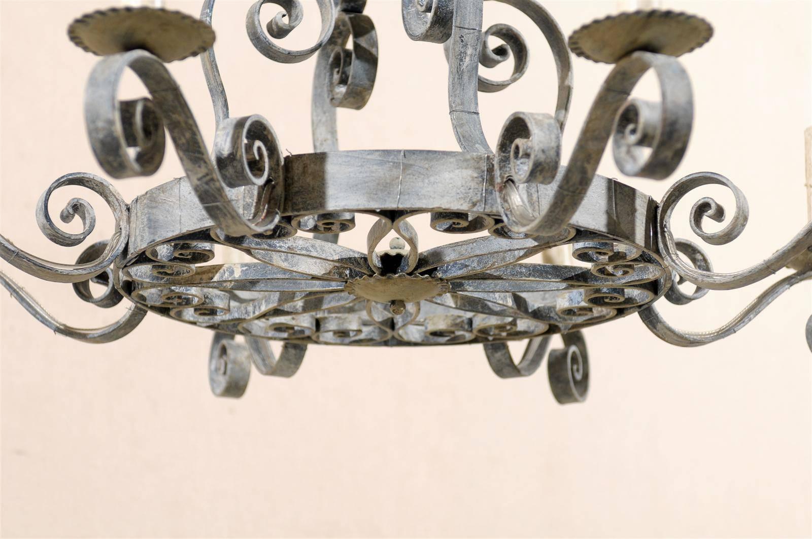 French Vintage Eight-Light Painted Iron Chandelier with S-Scrolls Throughout 1