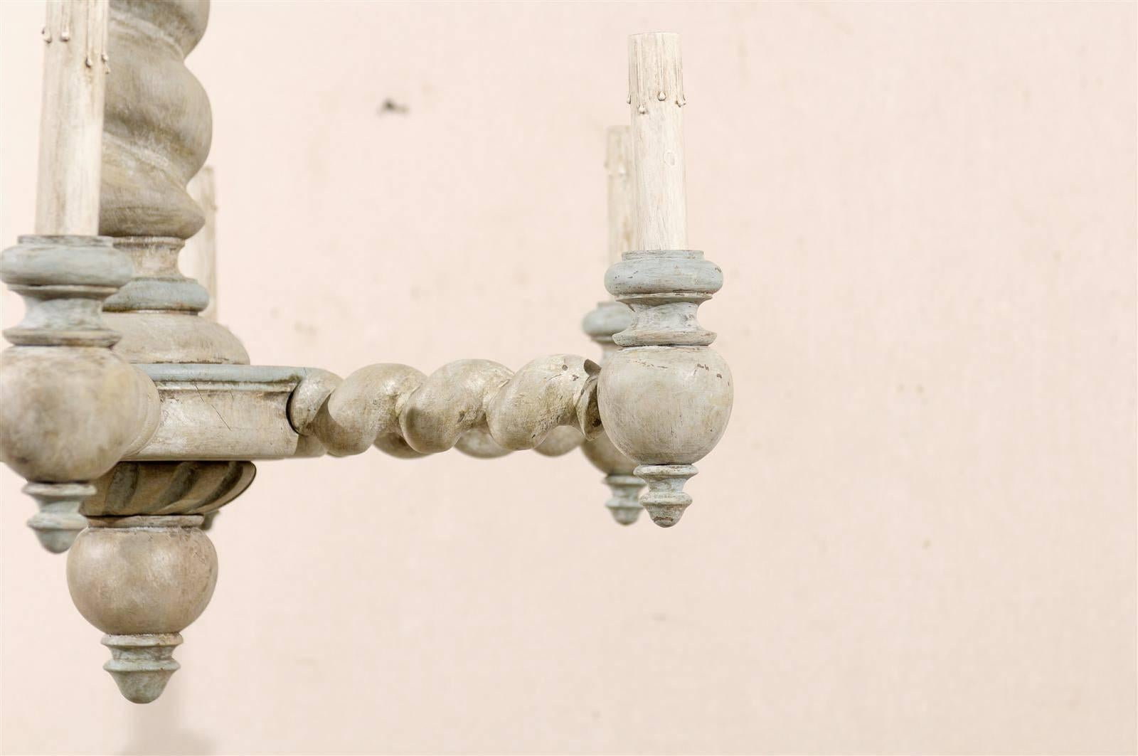 A French six-light painted wood chandelier with barley twist central column and arms from the 20th century. This chandelier has been rewired for the US.