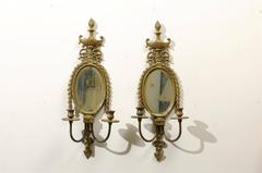 Pair of Early 20th Century Gilded Sconces with Oval Shape and Beveled Mirror