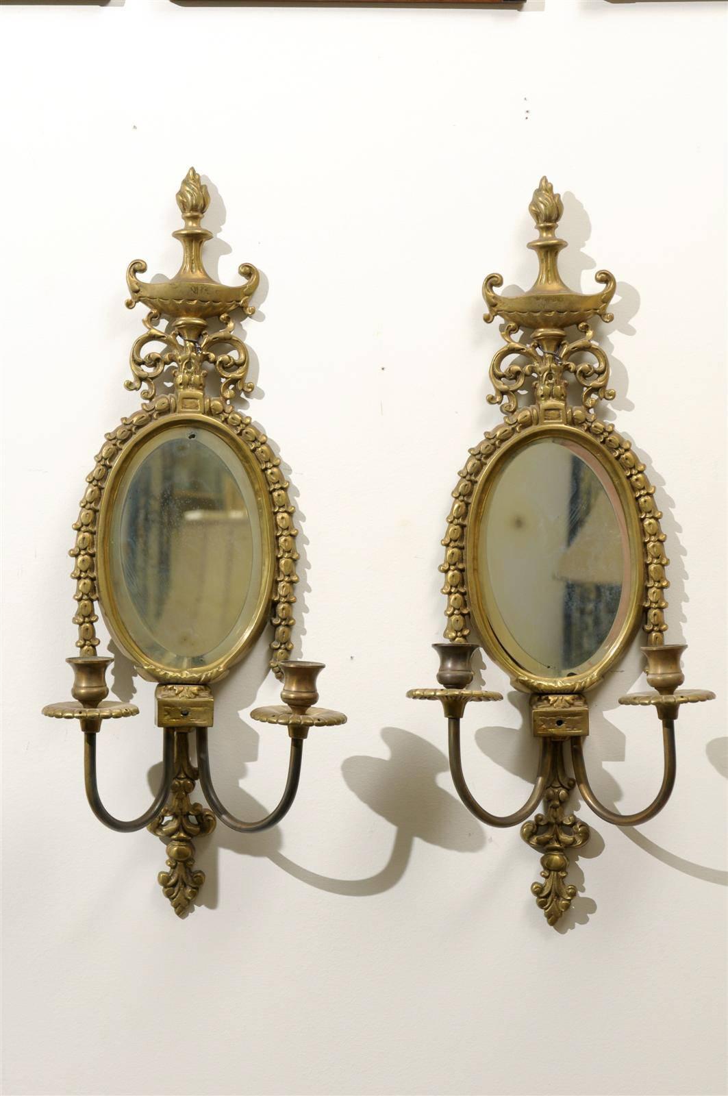 American Pair of Early 20th Century Gilded Sconces with Oval Shape and Beveled Mirror