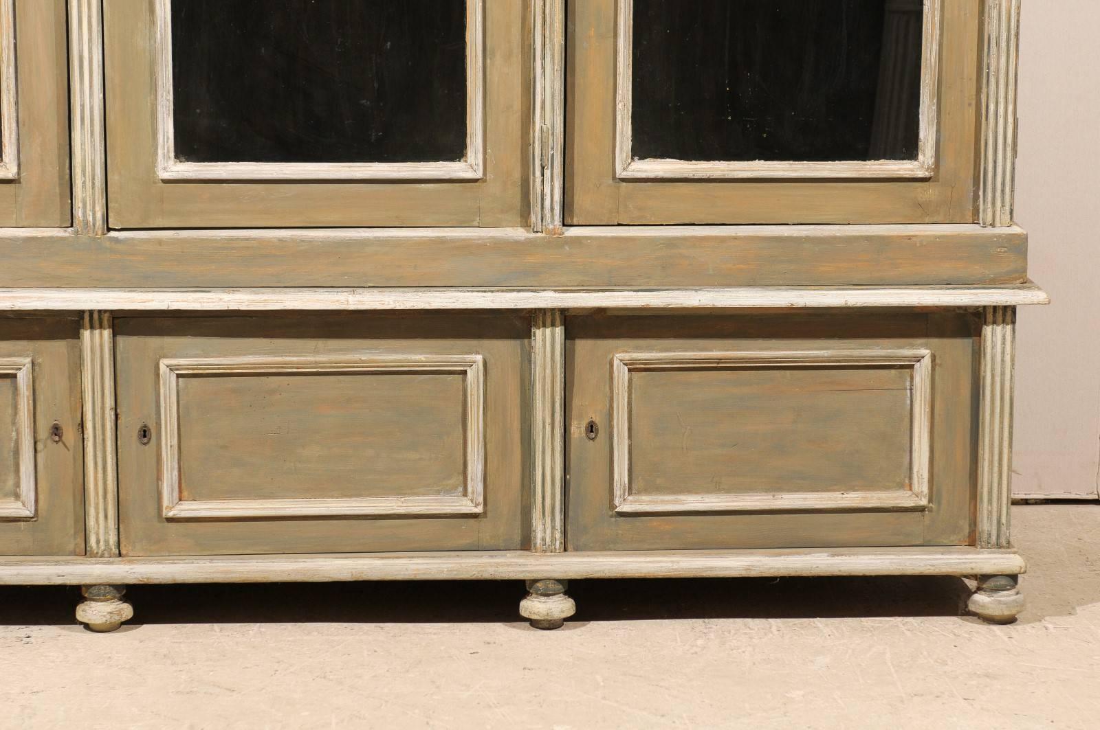 French 19th Century Wood Cabinet with Three Glass Doors Raised on Round Feet 5