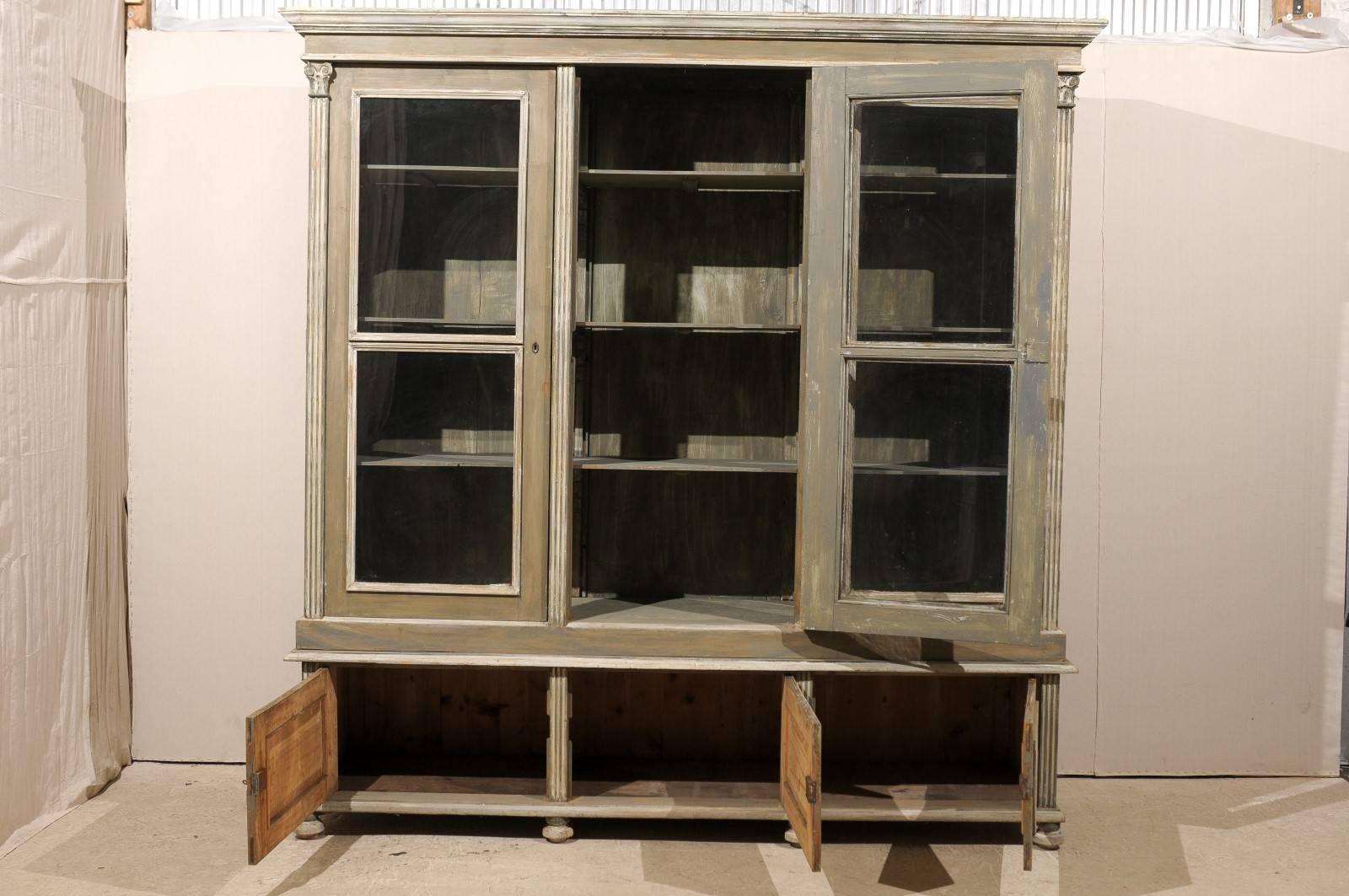 Painted French 19th Century Wood Cabinet with Three Glass Doors Raised on Round Feet