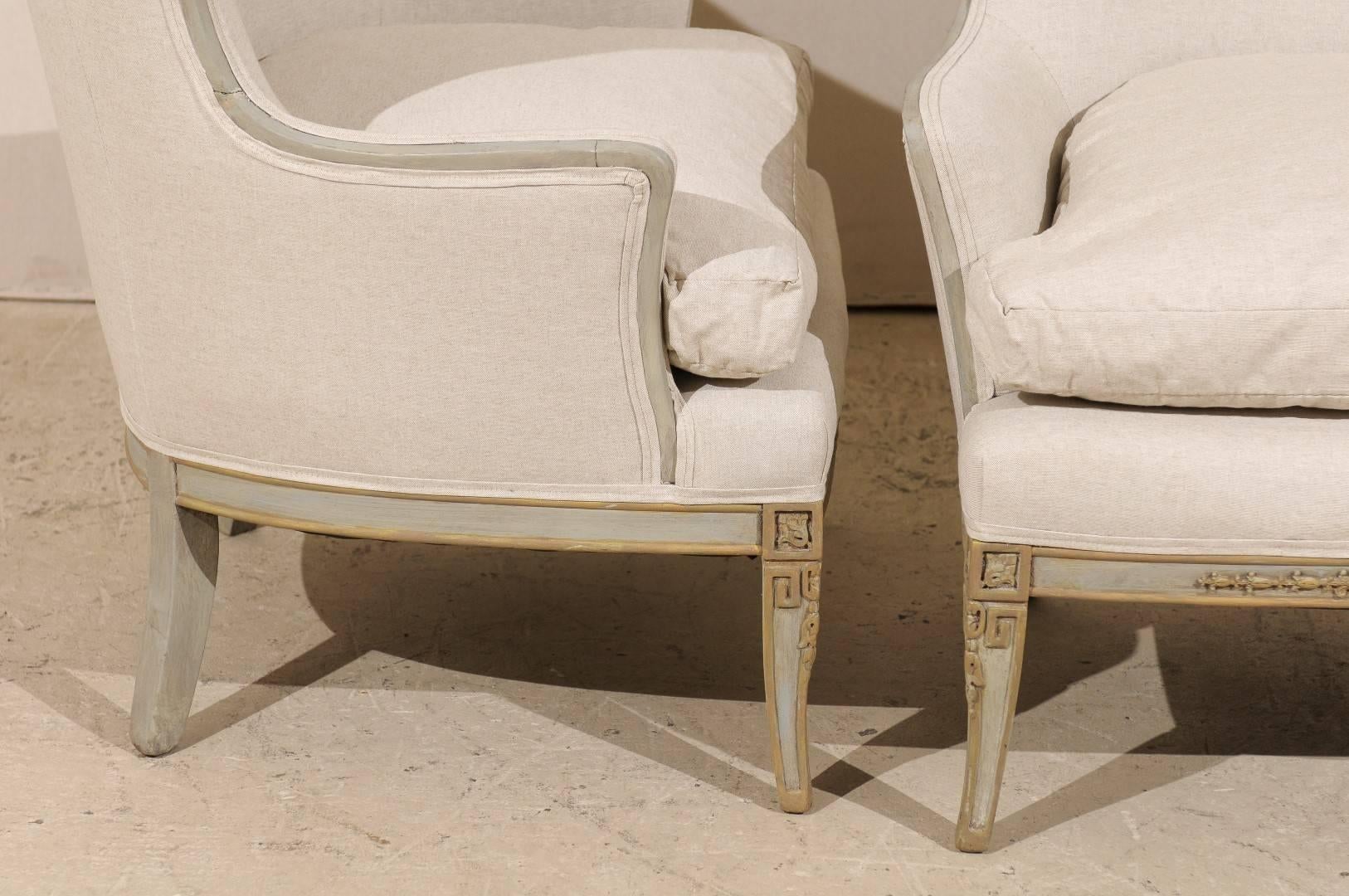 20th Century Pair of Painted Wood Wingback Chairs with Carved Details and New Upholstery