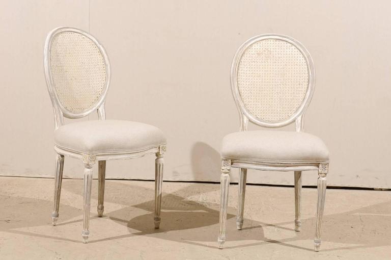 Pair Of Louis Xvi Style Oval Cane Back Chairs With Fluted Leg For A Pair Of American Louis Xvi Style Oval Cane Back Painted Wood Side Chairs This