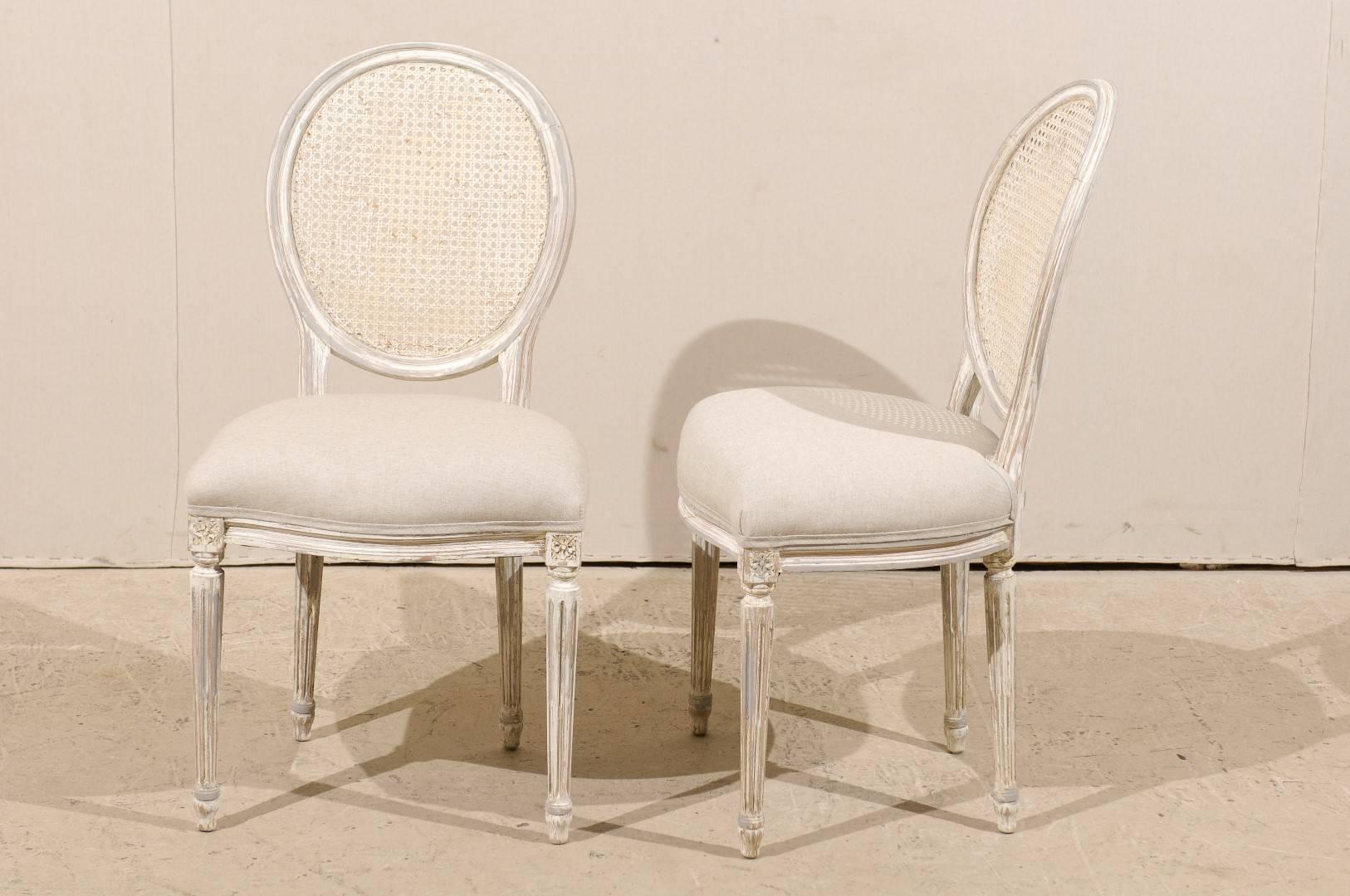 American Pair of Louis XVI Style Oval Cane Back Chairs with Fluted Leg