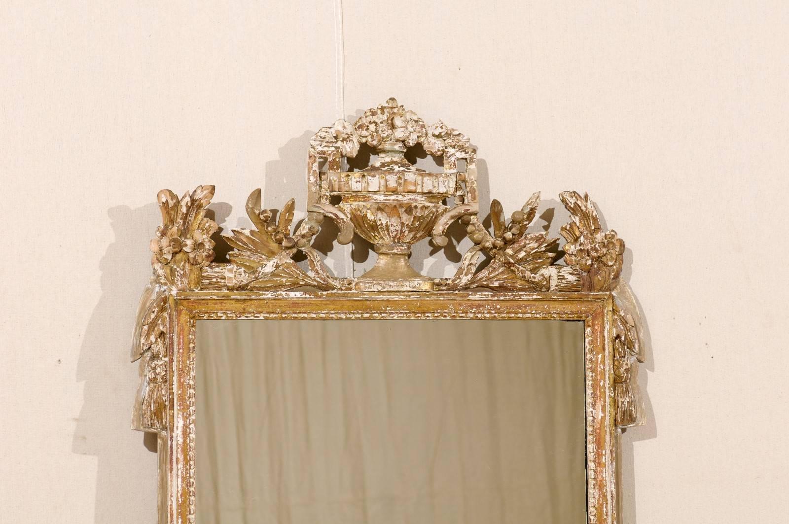 French Gilded and Ornately Carved Wood Mirror with Urn Motif Crest, Gold Color In Good Condition In Atlanta, GA