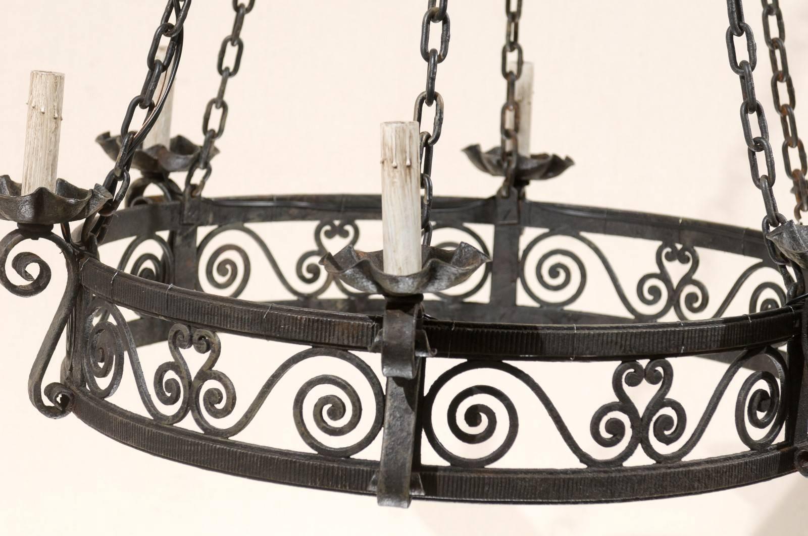20th Century French Circular Ring Shaped Six-Light Black Iron Chandelier with Scroll Motifs For Sale