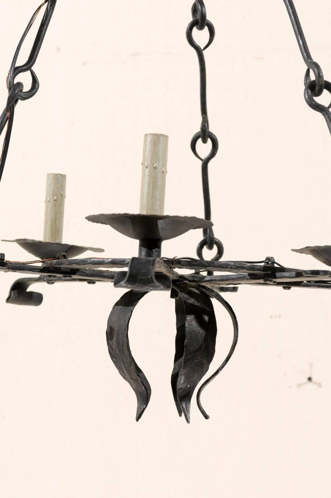 20th Century French Black Forged Iron Three-Light Chandelier with Leaf Motif at the Bottom