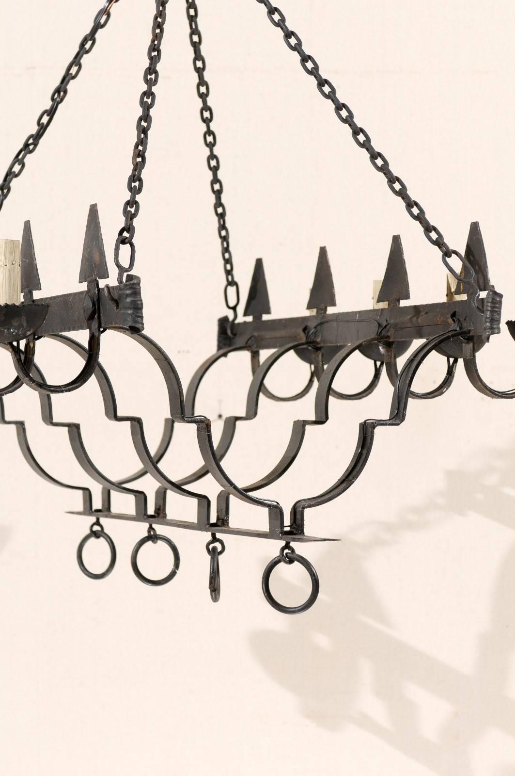Mid-Century Modern French Linear Eight-Light Black Forged Iron Chandelier, Rewired for US. For Sale