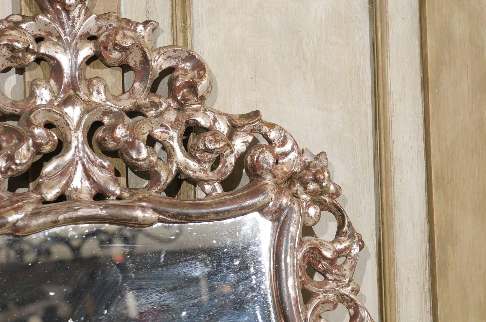 Ornately Carved Italian Mirror in Warm Bronze Color with Silver Accents For Sale 1