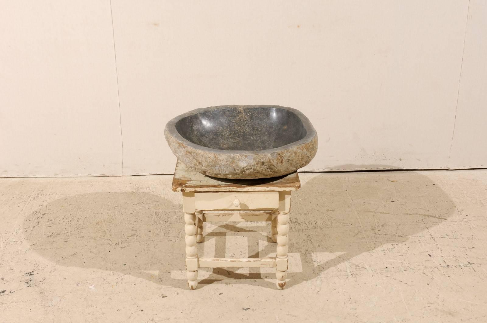 Sink Made from a River Rock / Boulder with Polished Black Interior, Tan Exterior 1
