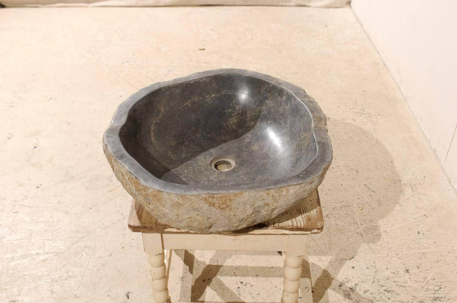 20th Century Sink Made from a River Rock / Boulder with Polished Black Interior, Tan Exterior