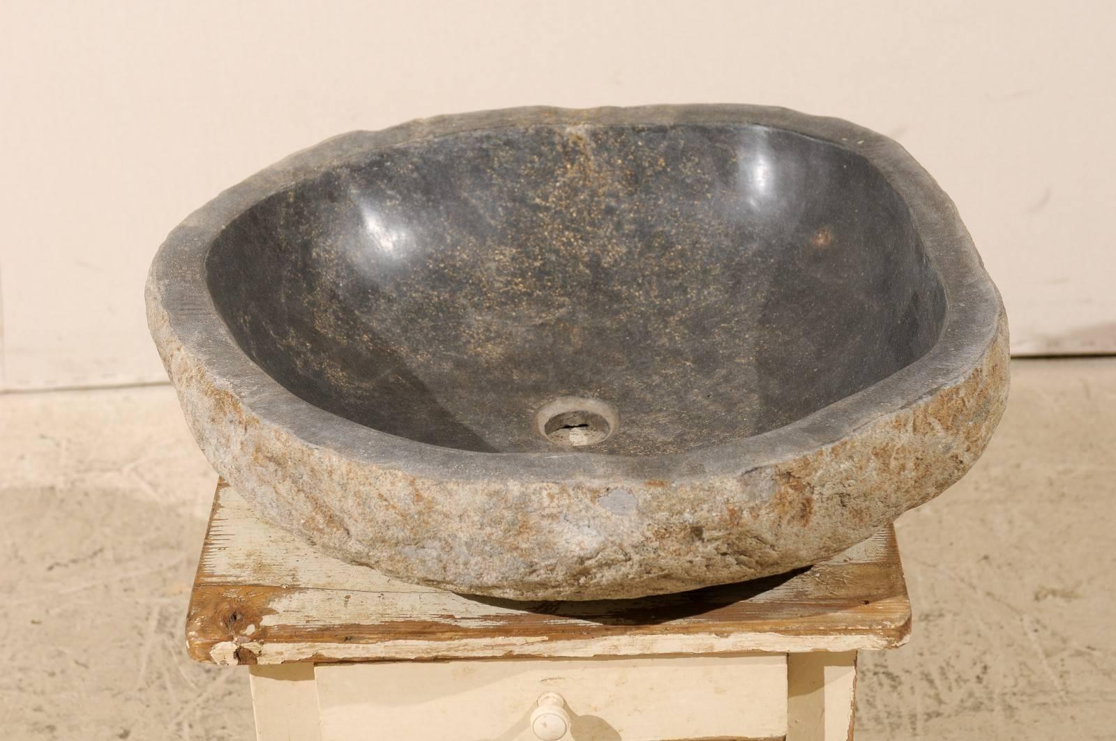 Stone Sink Made from a River Rock / Boulder with Polished Black Interior, Tan Exterior