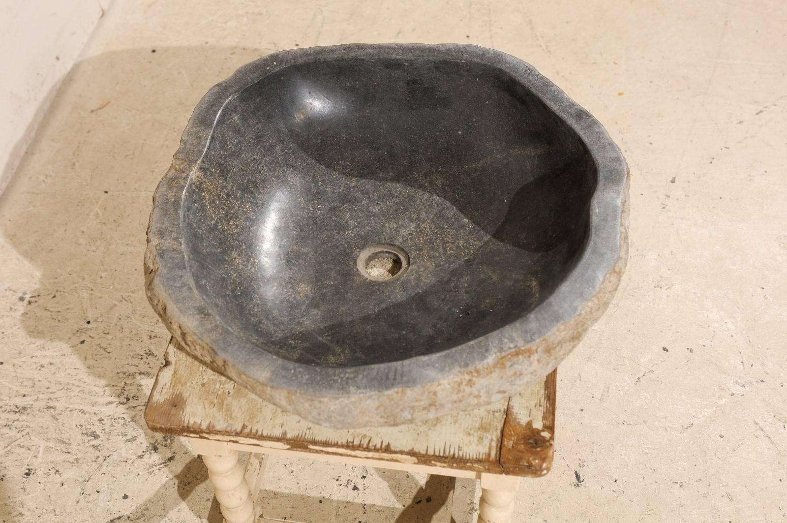 Sink Made from a River Rock / Boulder with Polished Black Interior, Tan Exterior 2