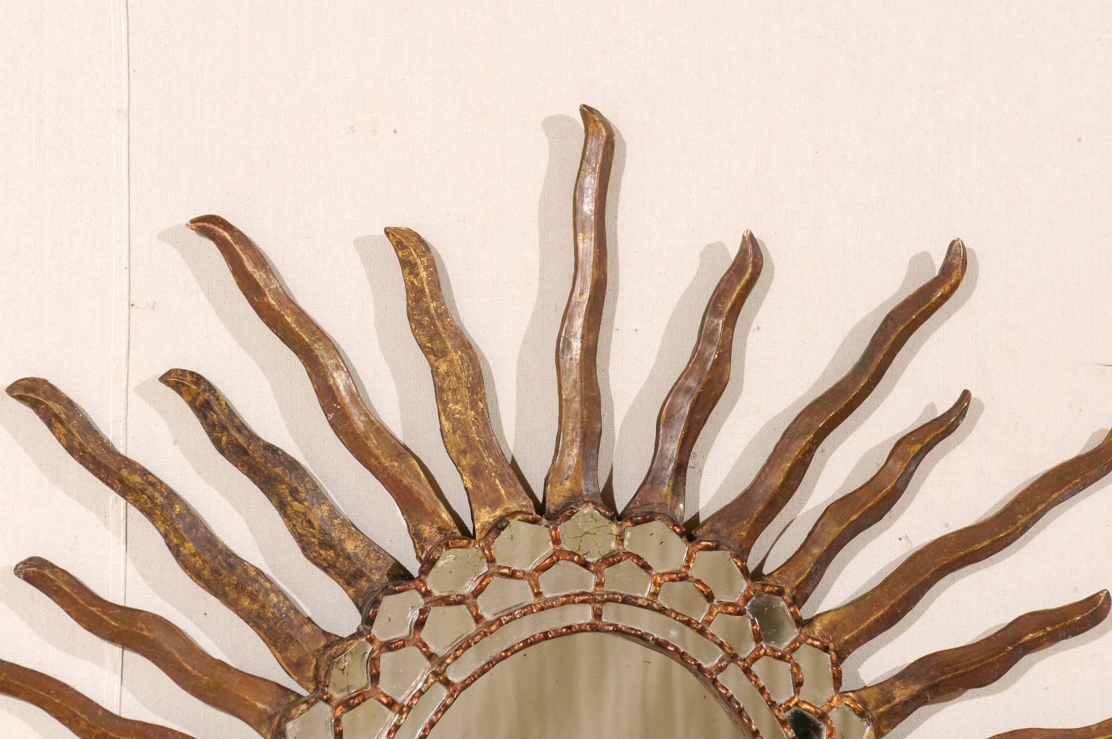 20th Century Spanish Oval Shaped Bronze and Gold Antiqued Sunburst Mirror, Intricate Surround