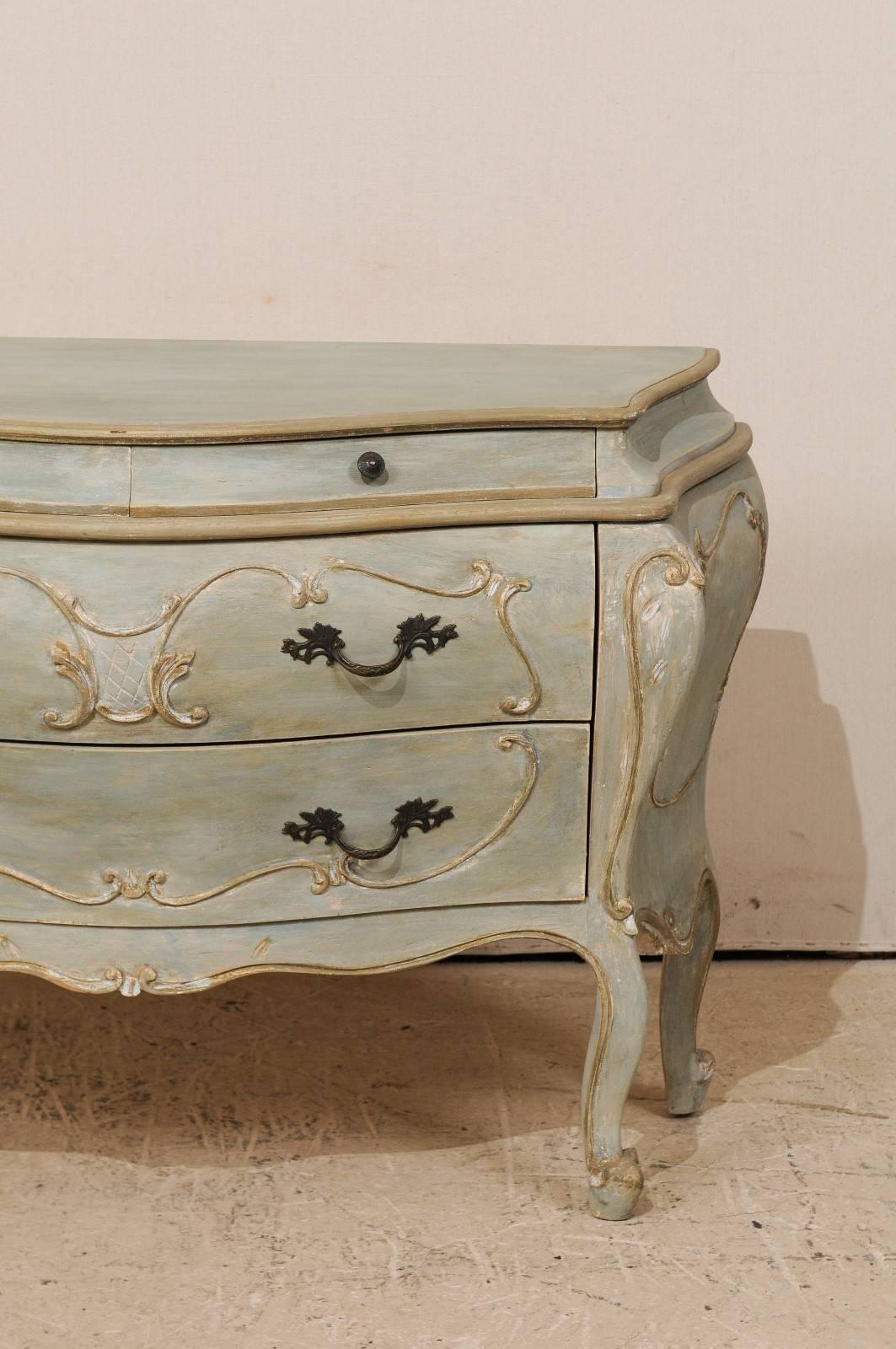 Carved Rococo Style Bombé Chest of Four Drawers with Grey, Blue, Green & Beige Accents For Sale
