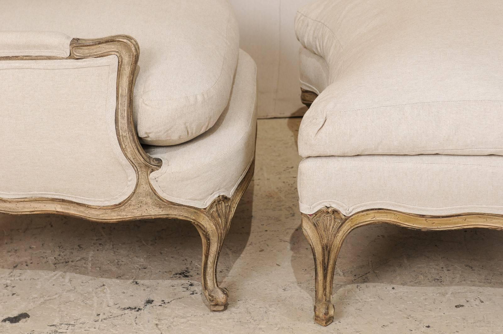 Three-Piece Set of French Bergères Chair Pair with Pouf / Ottoman, Neutral Tones 3