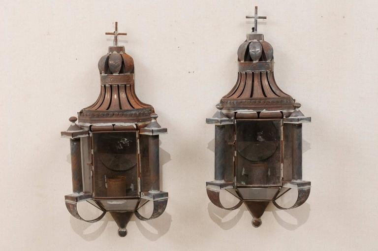 Pair of Mexican Dark Colored Patinated Single Candle Sconces with Crosses For Sale at 1stdibs