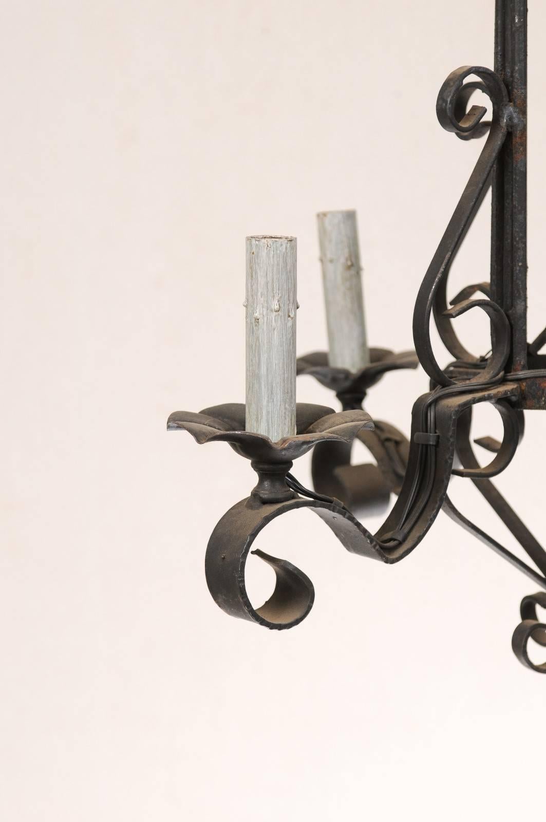 20th Century Tall French Four Light Black Iron C-Scrolled and S-Scrolled Chandelier For Sale