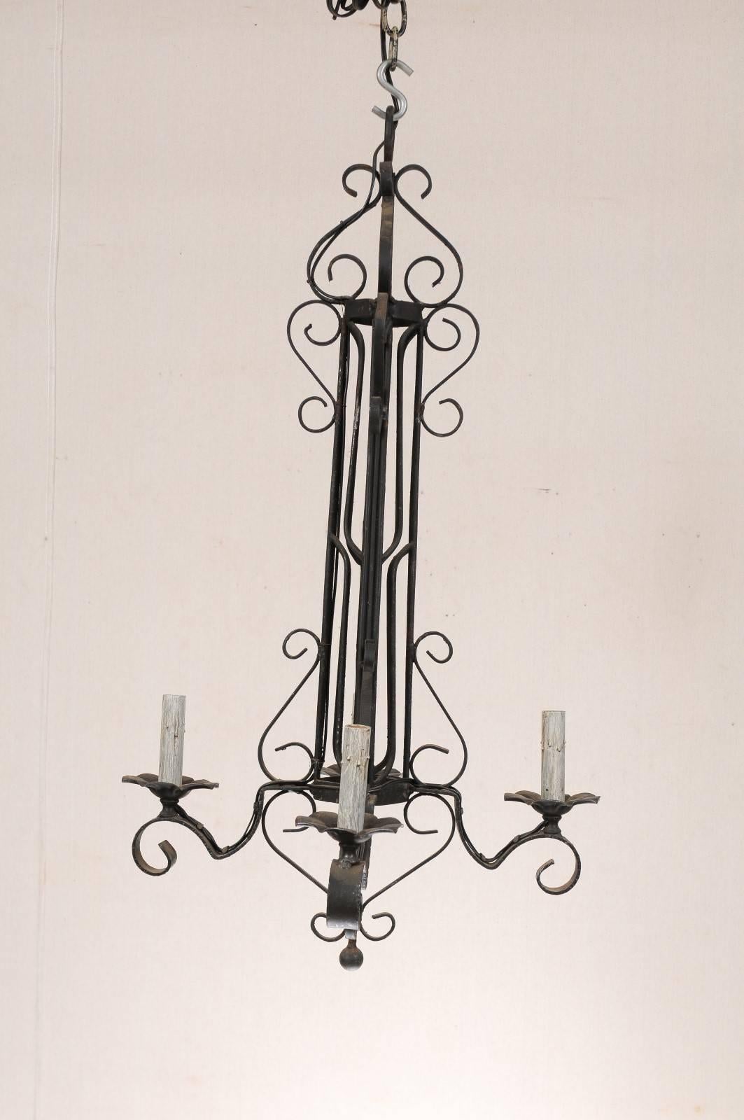 Tall French Four Light Black Iron C-Scrolled and S-Scrolled Chandelier In Good Condition For Sale In Atlanta, GA