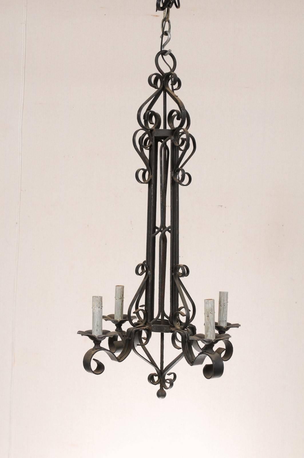 Patinated Tall French Four Light Black Iron C-Scrolled and S-Scrolled Chandelier For Sale