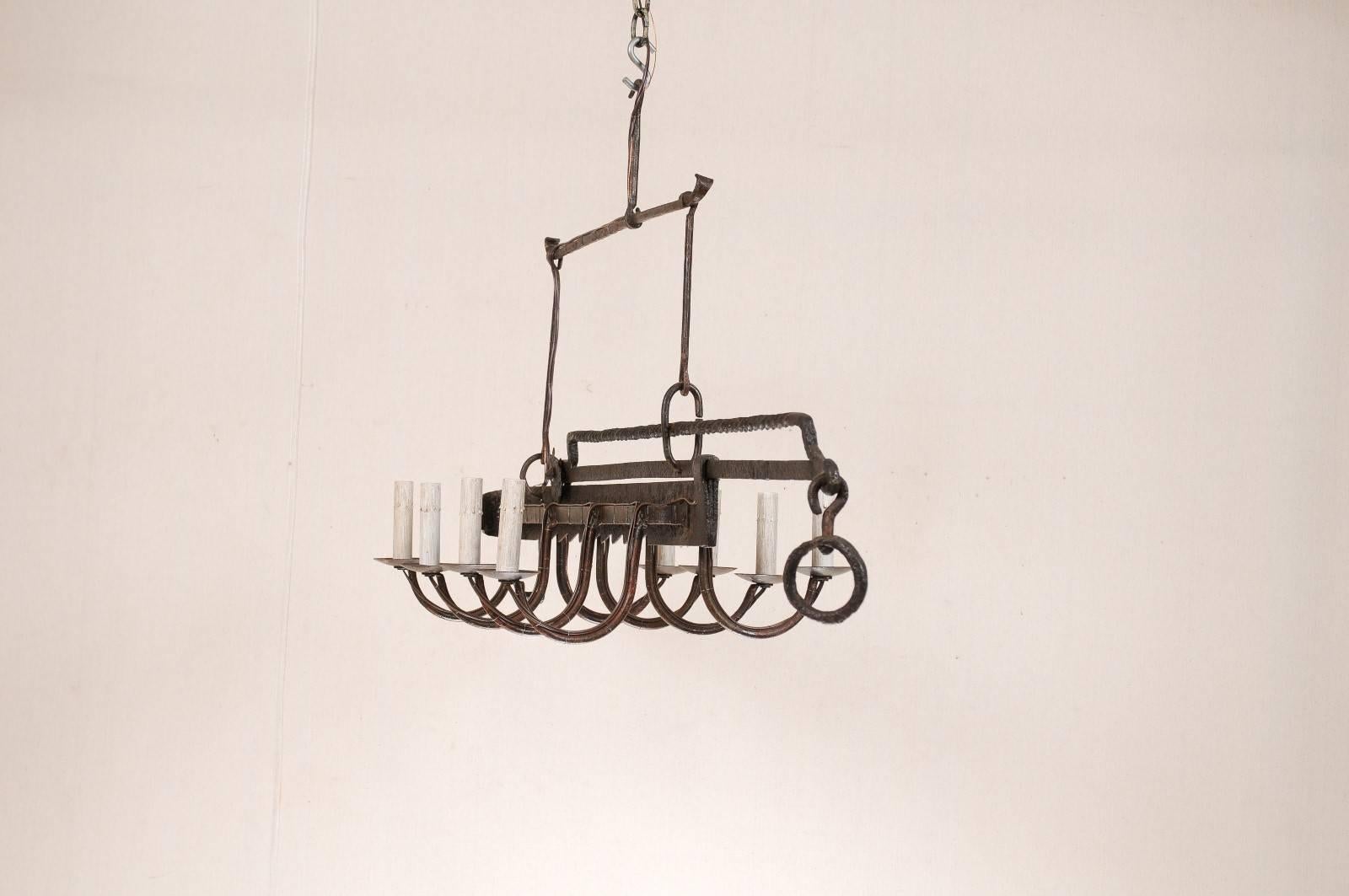 Iron French Mid-Century Eight-Light Chandelier Made of 19th Century Spit Jack