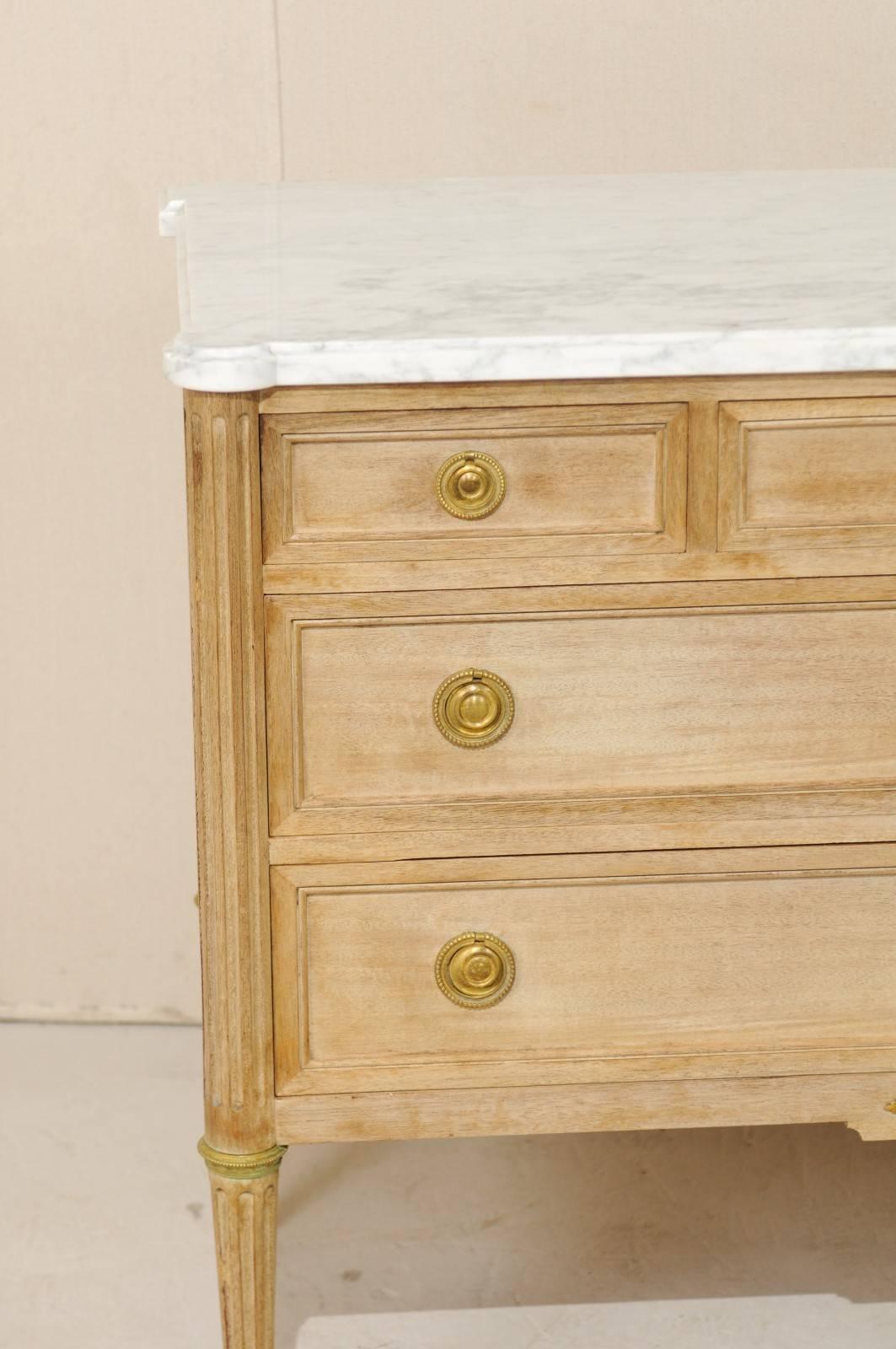 French Marble-Top Chest of Bleached Mahogany Wood with Gold Colored Accents In Good Condition In Atlanta, GA