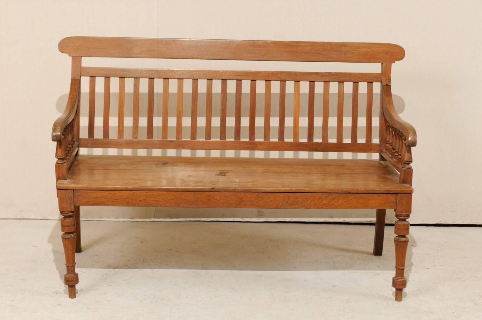 20th Century British Colonial Style Teak Wood Bench with Slats on the Backrest & Turned Legs