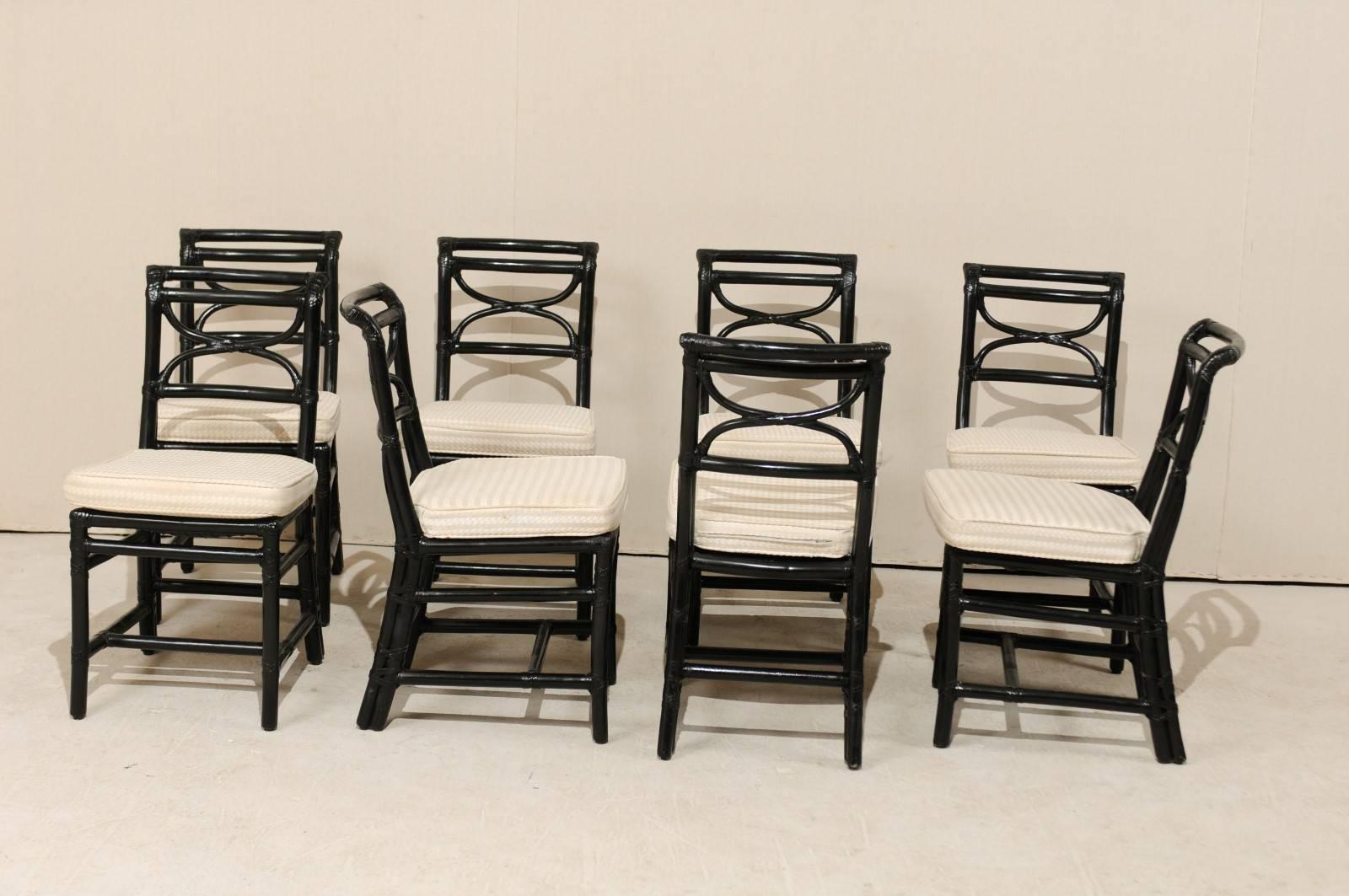 American Set of Eight McGuire Rattan Dining Side Chairs in Black, Curule Shaped Backs