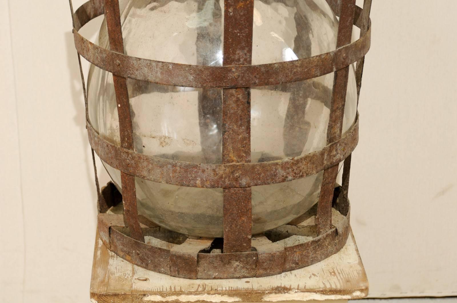 Mid-Century French Patinated Vintner Iron Basket with Demijohn Wine Bottle 1