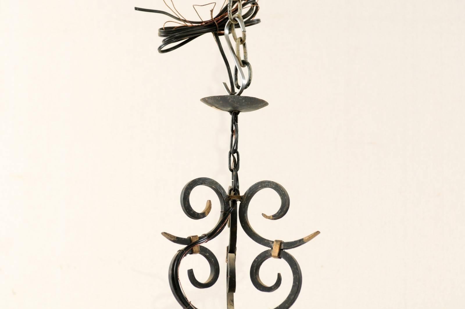 French Forged Iron Three-Light Chandelier with Scrolled Arms and Gilded Accents 3