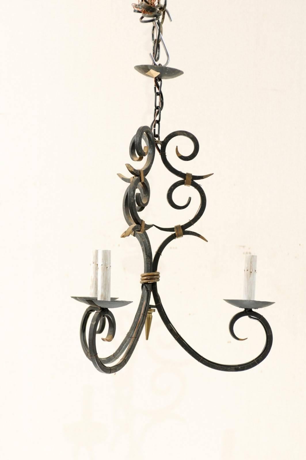 20th Century French Forged Iron Three-Light Chandelier with Scrolled Arms and Gilded Accents
