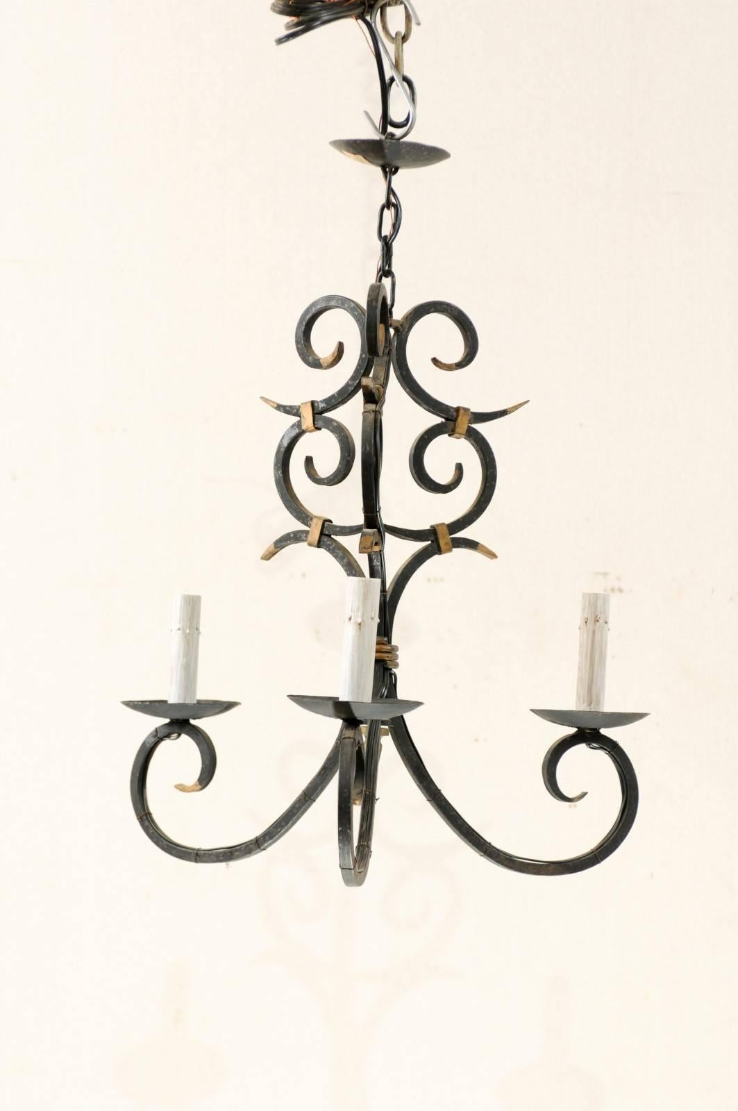 French Forged Iron Three-Light Chandelier with Scrolled Arms and Gilded Accents 1