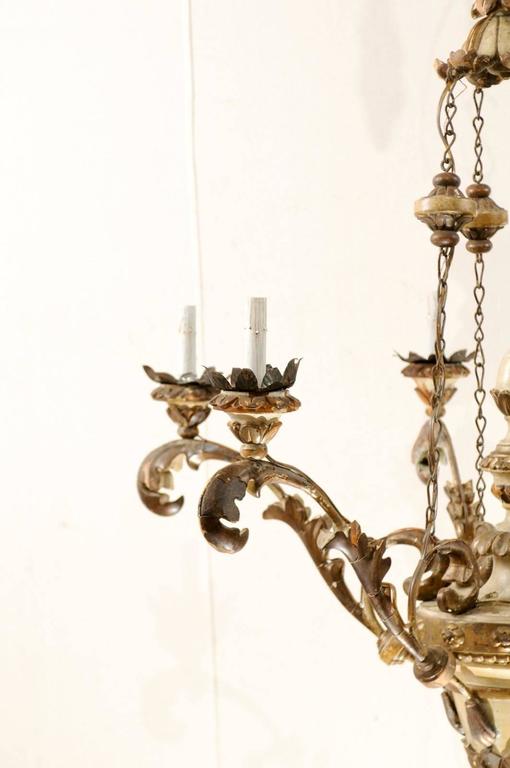 Exquisite Pair of Italian Early 20th Century Wood Chandeliers with Gilt and Paint For Sale at