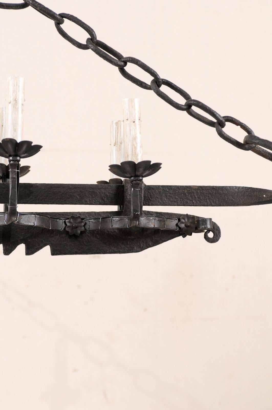 Mid-Century Eight-Light Forged Iron Spit-Jack Chandelier from 19th Century 4