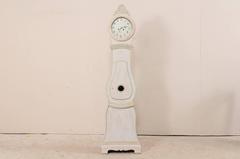 19th Century Swedish Mora Floor Clock with Nicely Carved Crest and Neutral Tones