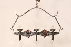 French Regal Vintage Six-Light Hammered Iron Chandelier with Shield Motifs