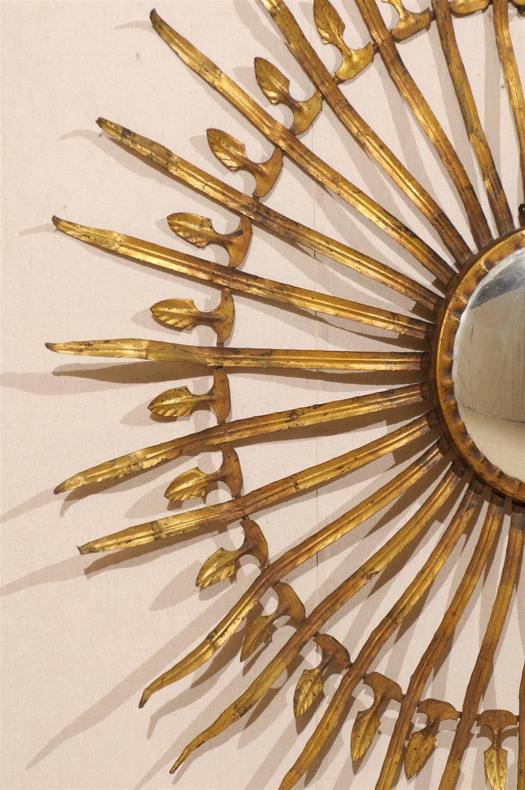 French Sunburst and Foliage Motif Gilded Metal Wall Ornament with Round Mirror In Good Condition In Atlanta, GA