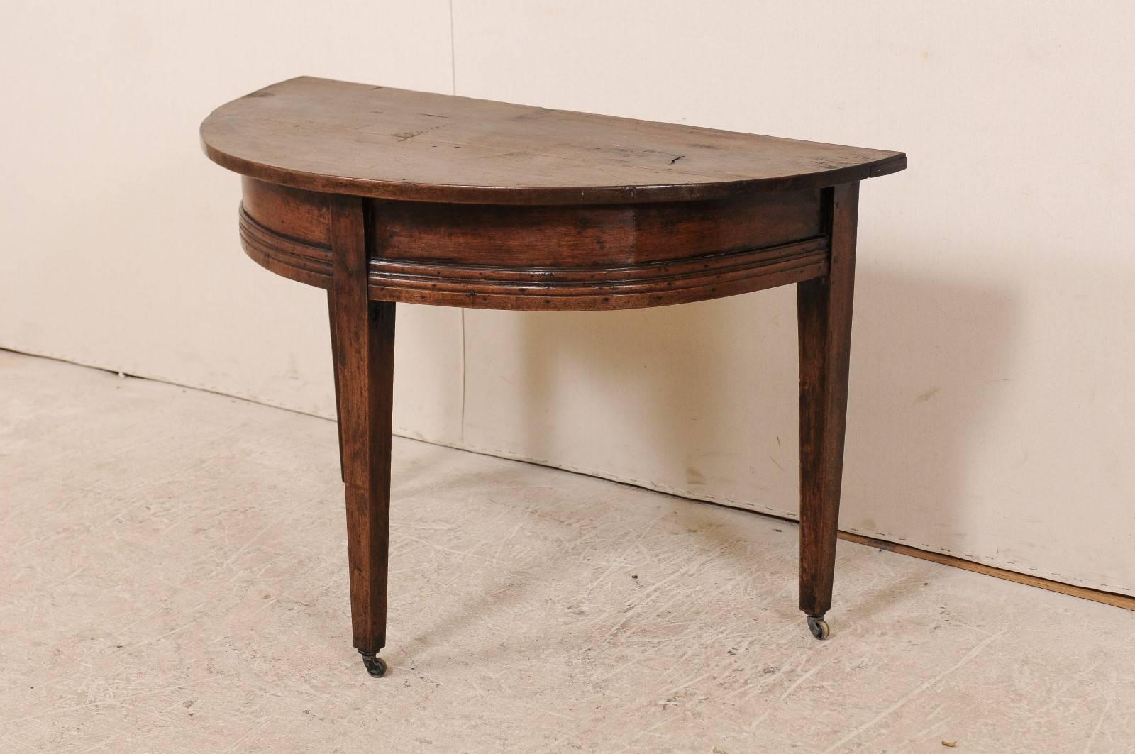 Carved Late 18th Century Italian Rich Walnut Wood Demilune with Petite Wheel Feel