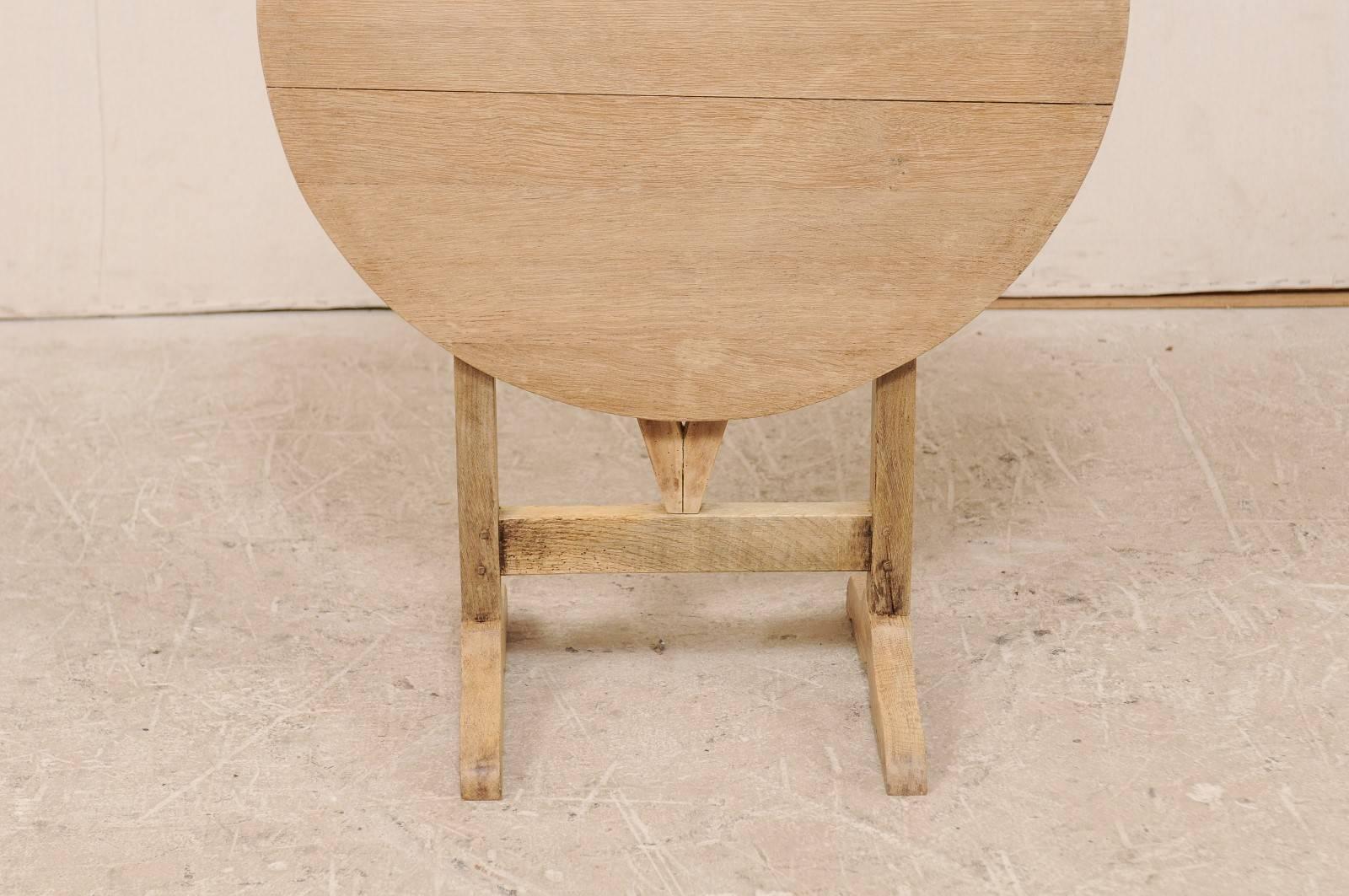 French 20th Century Round Wine Tasting Table with Pale Bleached Wood Finish In Good Condition In Atlanta, GA