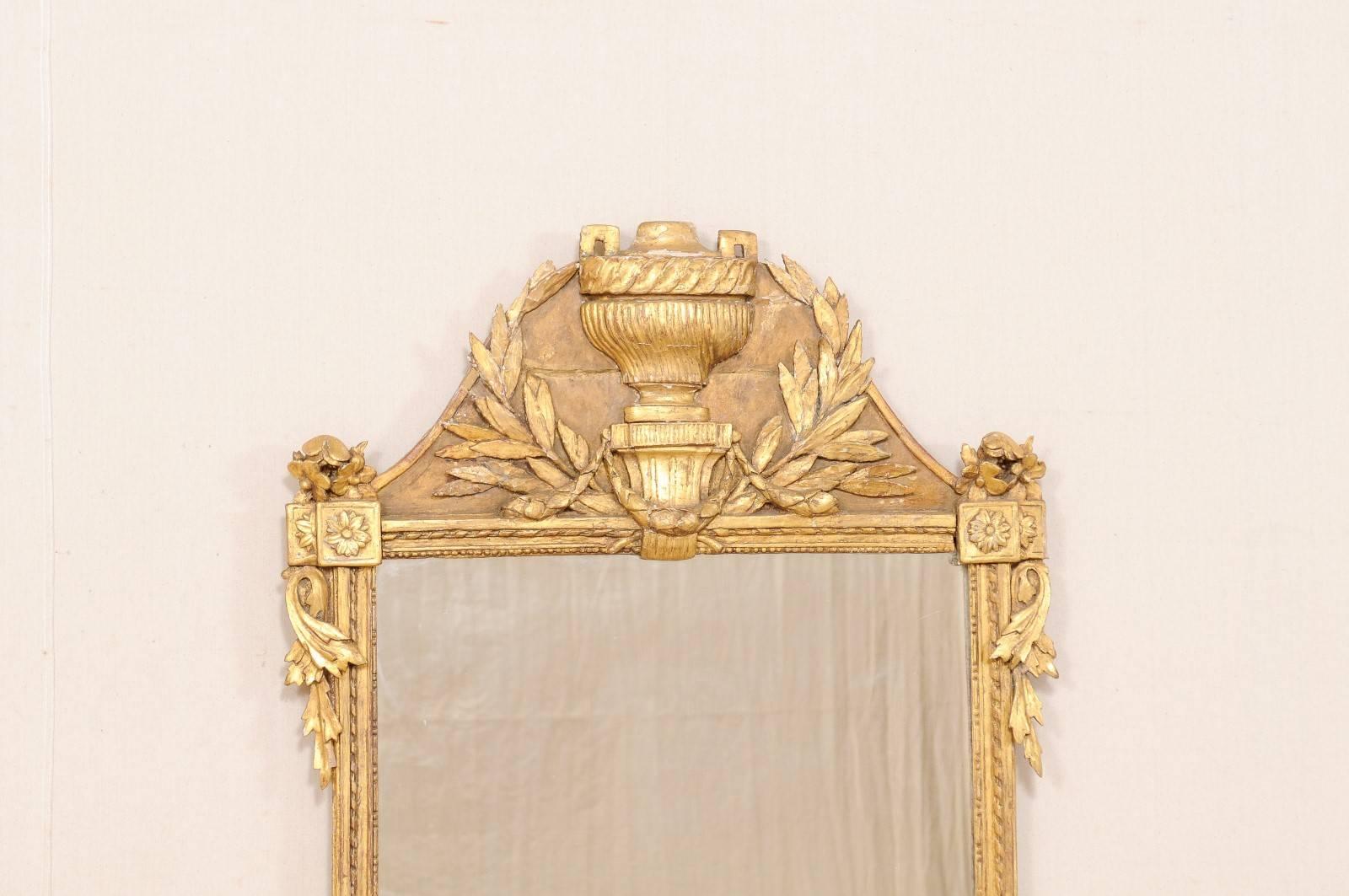 18th Century French Richly Carved Gilded Wood Tall Mirror with Urn Motif Crest In Good Condition In Atlanta, GA