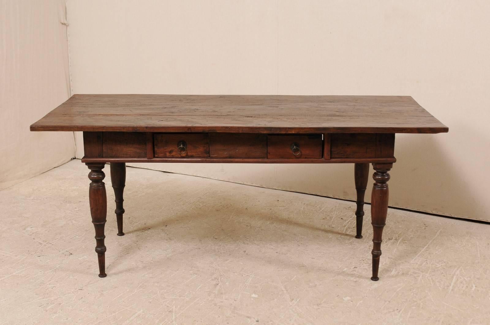 Carved Brazilian Table from the Early 20th Century of Rich Brown Wood with Two Drawers
