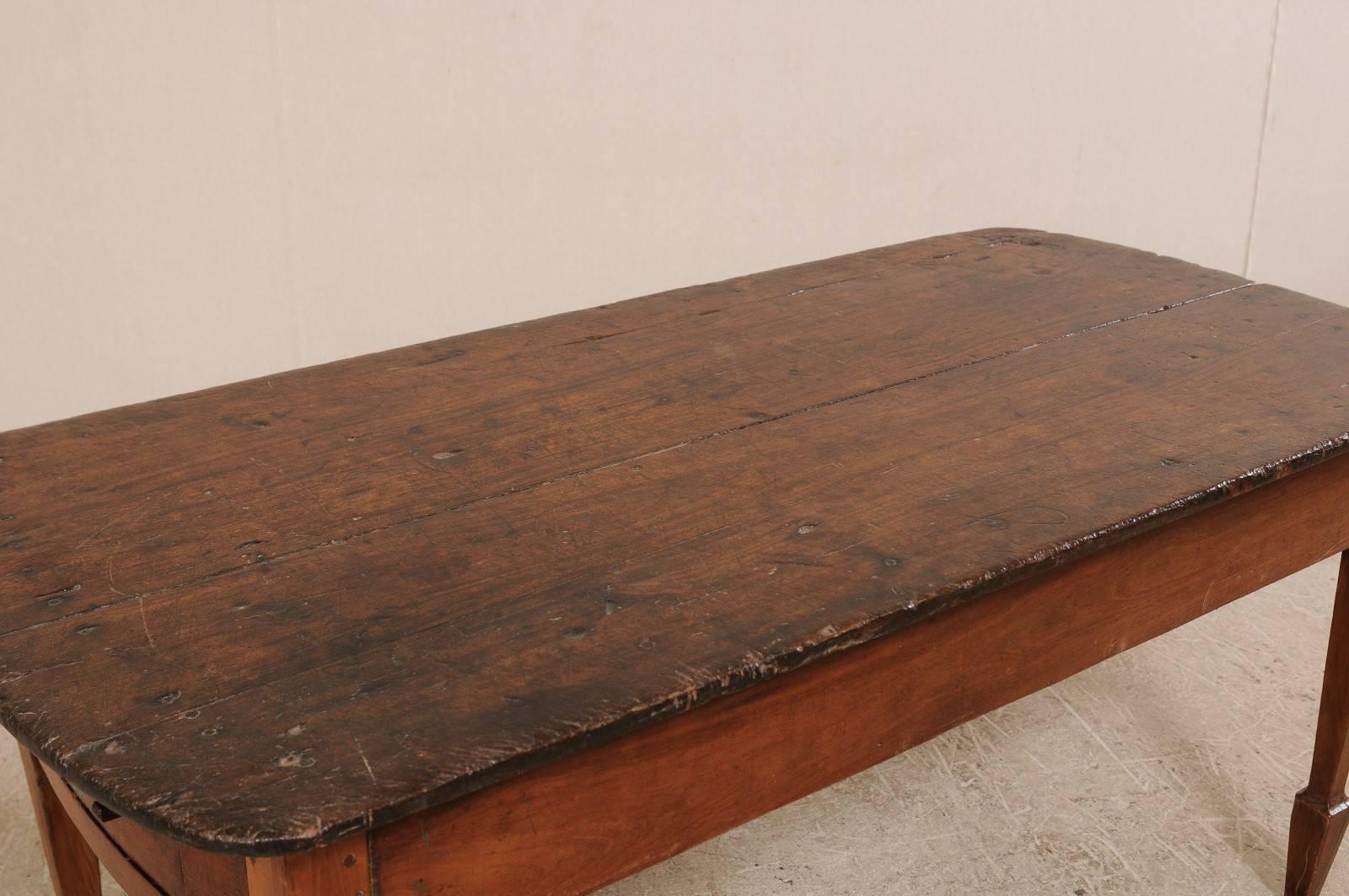 Early 20th Century Brazilian Peroba Wood Table with Two Drawers and Spaded Feet 2