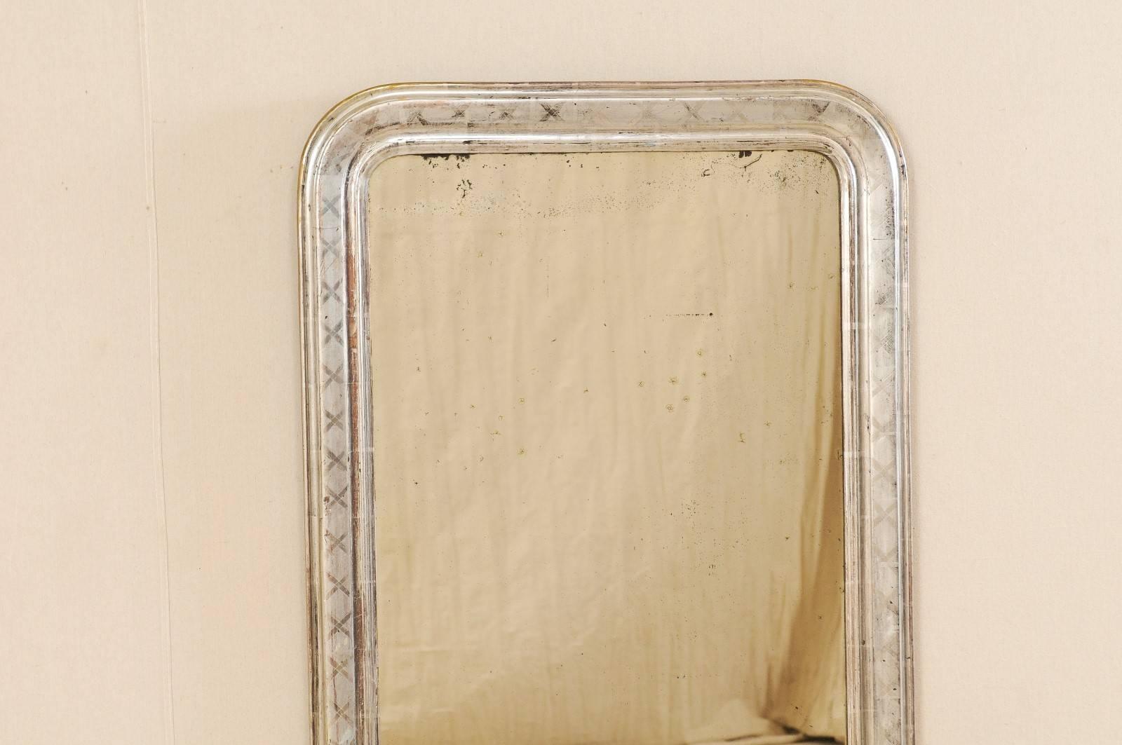 Carved French Louis Philippe Style Silver Gilt Mirror from the Late 19th Century