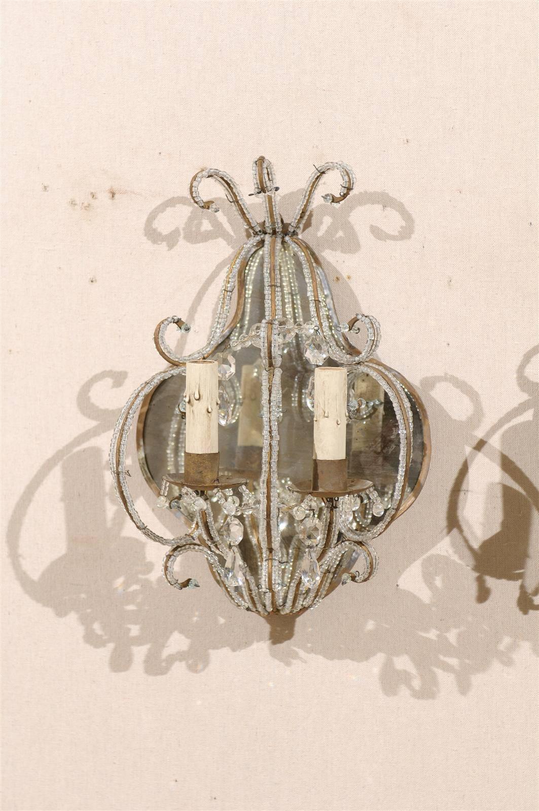 Pair of Italian Mirrored Sconces with Elegant Beaded Armature and Scrolls In Good Condition In Atlanta, GA
