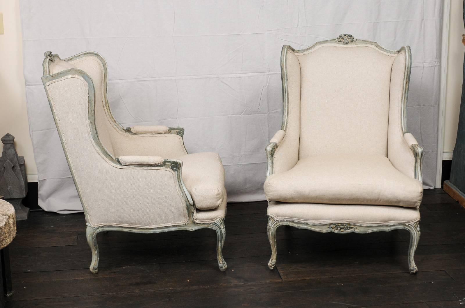 Pair of Mid-20th Century French Carved Wood and Upholstered Wingback Chairs 1