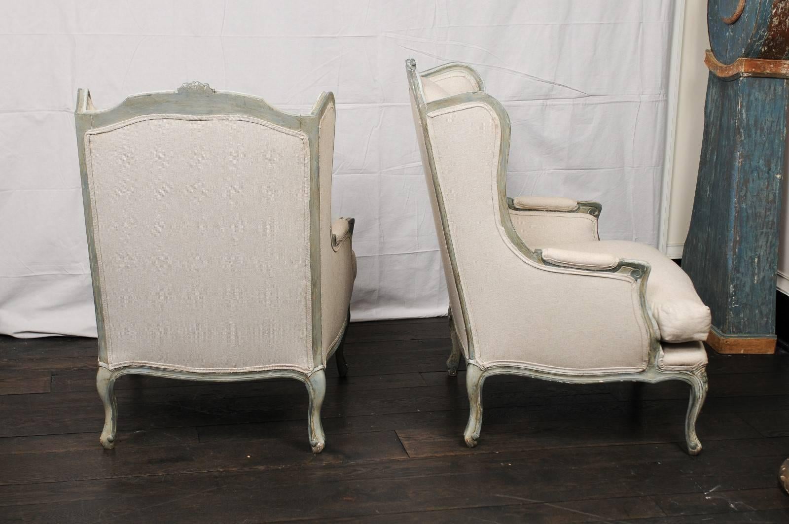 Pair of Mid-20th Century French Carved Wood and Upholstered Wingback Chairs 4