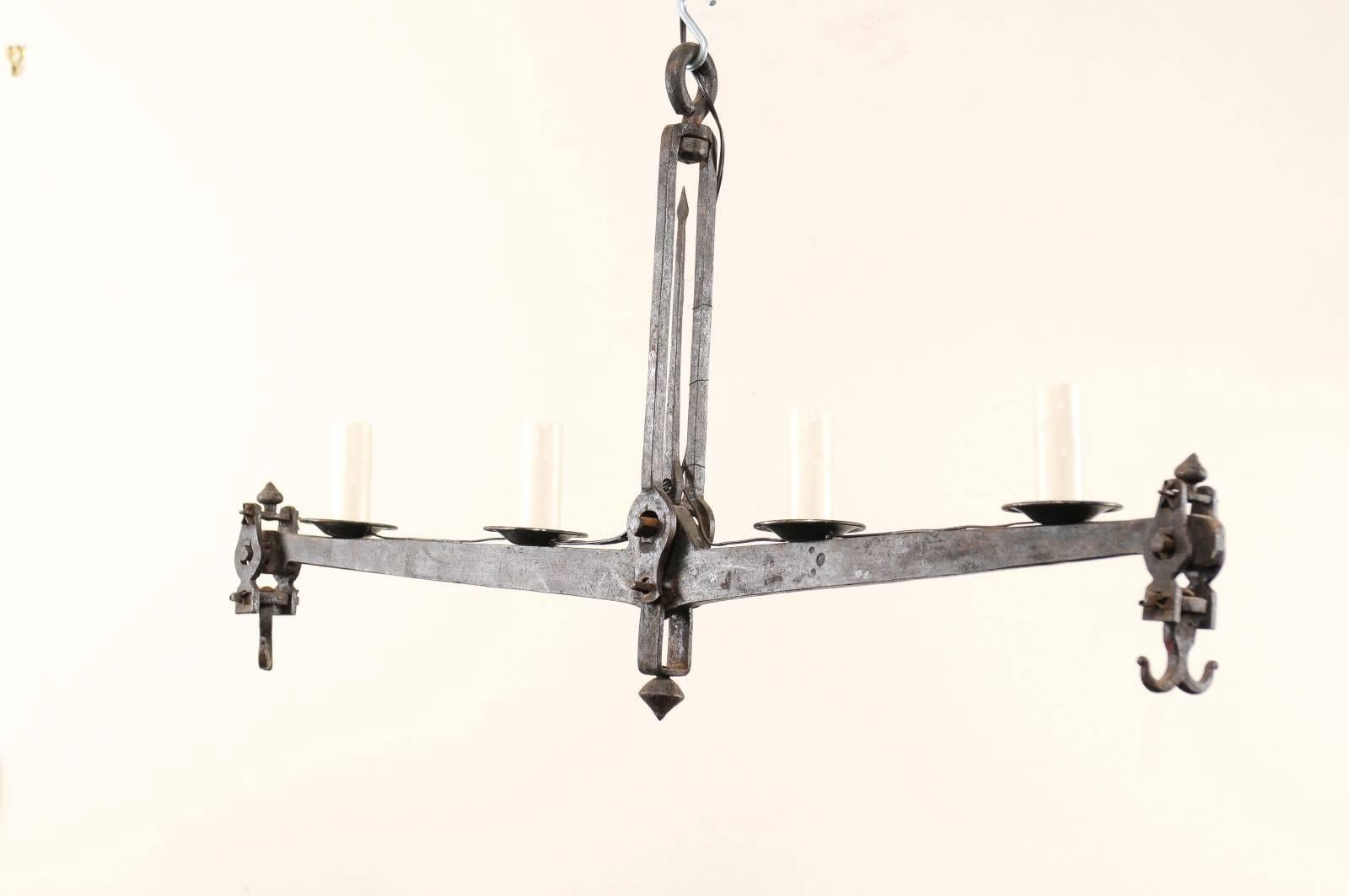 Patinated Mid-20th Century French Wrought Iron Scale Chandelier with Wide Linear Shape