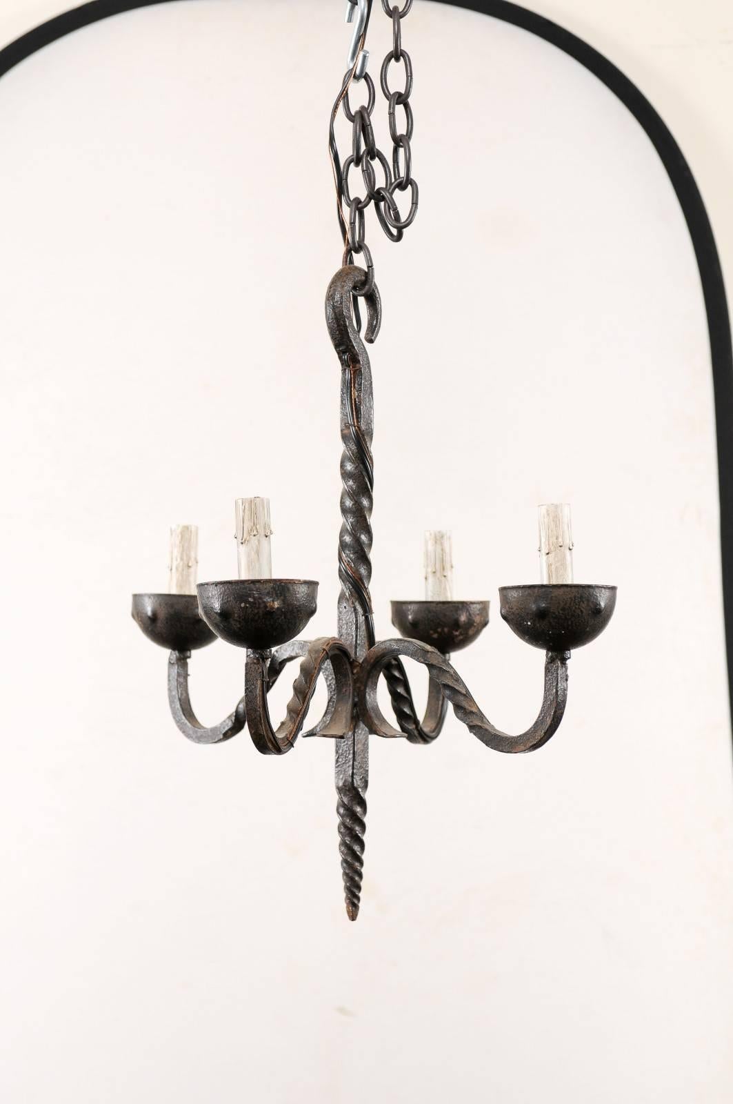 Patinated French Vintage Wrought Iron Four-Light Chandelier with Twisted Central Column