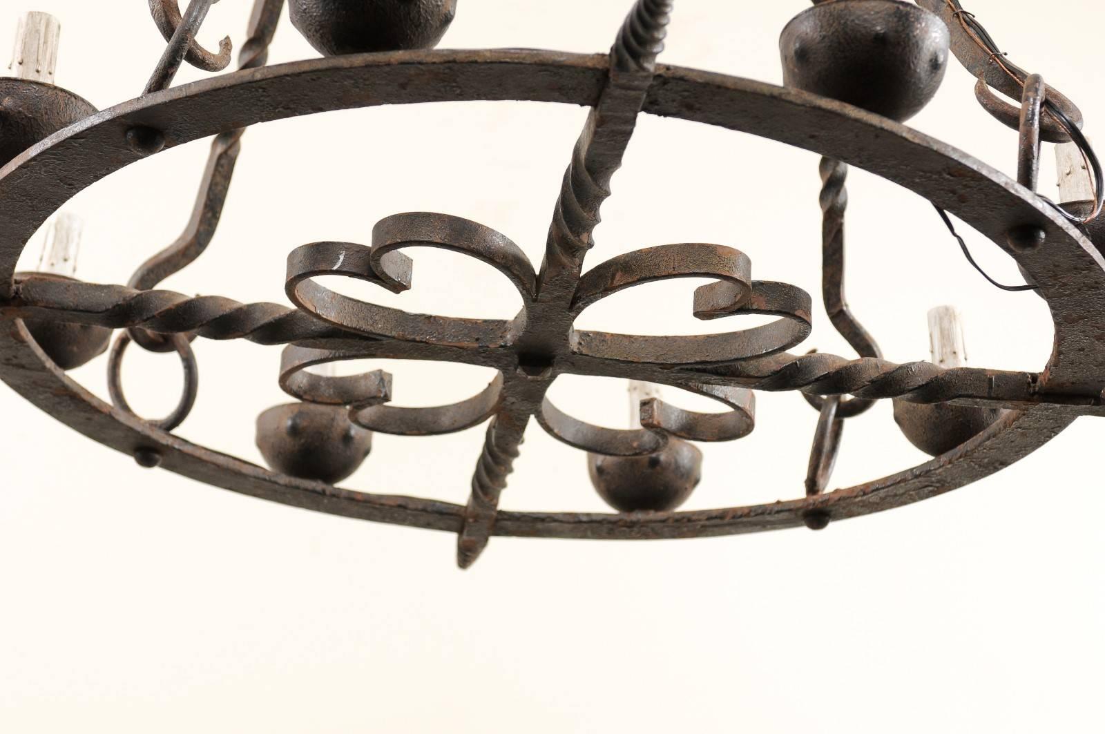 French Eight-Light Hand-Forged Iron Circular Chandelier w/Beautiful Suspension For Sale 1